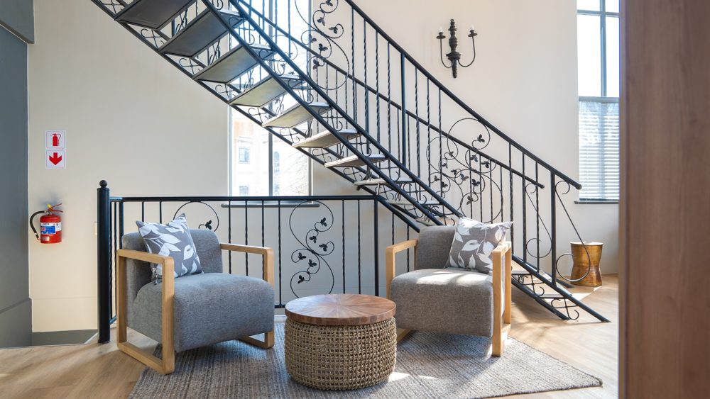 Armchairs beside the staircase